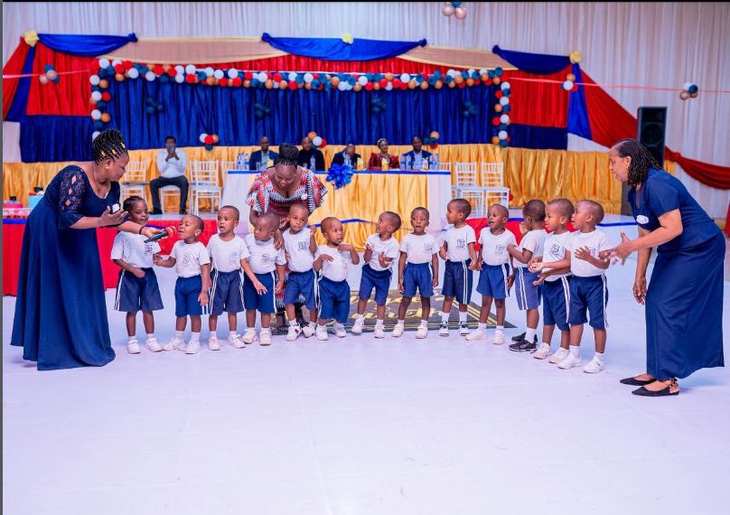 Pre-school students performing at graduation